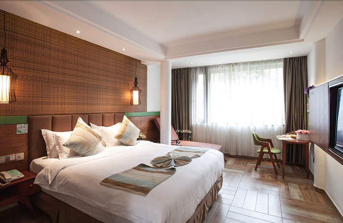 Imagen de la habitación del Hotel Yurong West Lake Cottage Resort. Foto 4