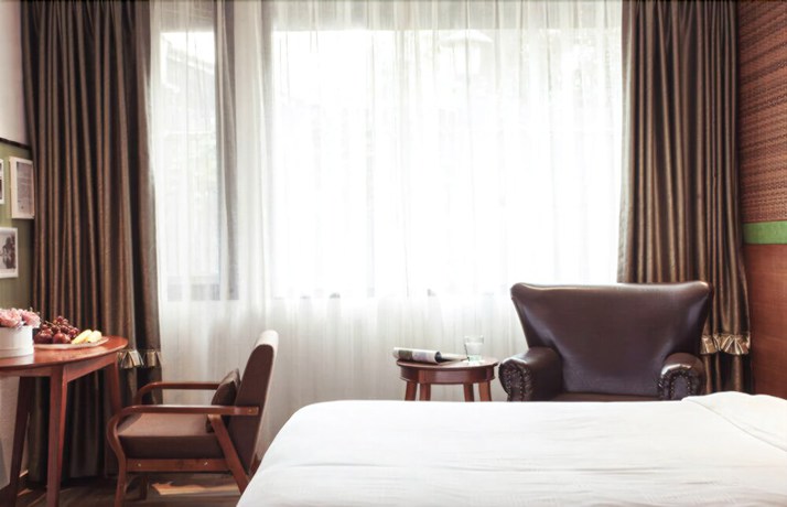 Imagen de la habitación del Hotel Yurong West Lake Cottage Resort. Foto 5