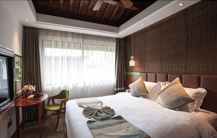 Imagen de la habitación del Hotel Yurong West Lake Cottage Resort. Foto 7