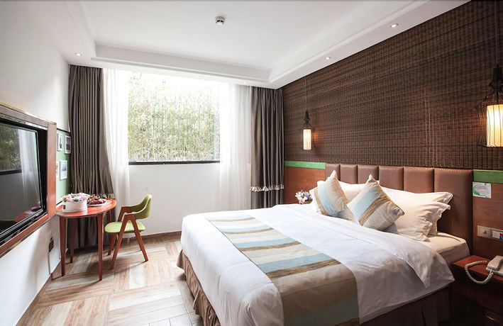 Imagen de la habitación del Hotel Yurong West Lake Cottage Resort. Foto 10