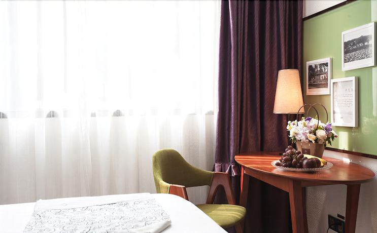 Imagen de la habitación del Hotel Yurong West Lake Cottage Resort. Foto 11
