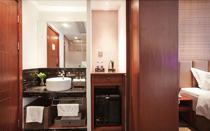 Imagen de la habitación del Hotel Yurong West Lake Cottage Resort. Foto 13