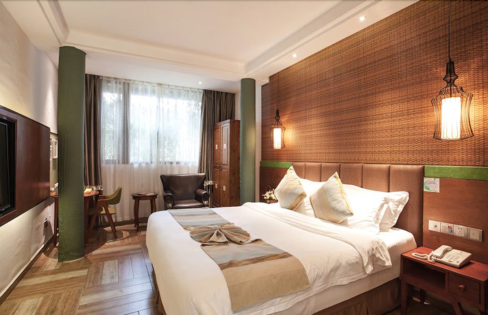 Imagen de la habitación del Hotel Yurong West Lake Cottage Resort. Foto 16