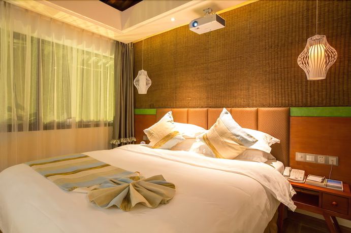 Imagen de la habitación del Hotel Yurong West Lake Cottage Resort. Foto 20