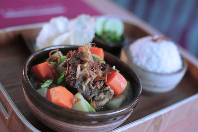 Imagen del bar/restaurante del Hotel Yusra Inn Hotel Bekasi. Foto 3