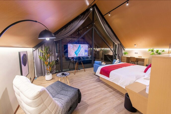 Imagen de la habitación del Hotel Yusu Star. Foto 11