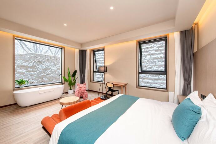 Imagen de la habitación del Hotel Yusu Star. Foto 17