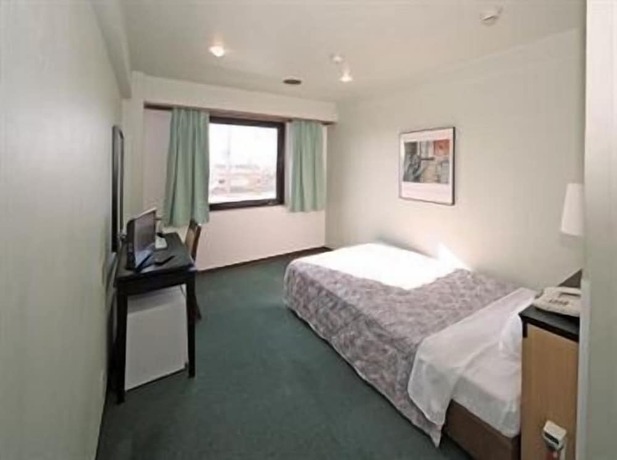 Imagen de la habitación del Hotel Yutaka Wing. Foto 25