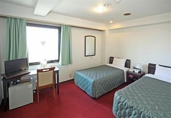 Imagen de la habitación del Hotel Yutaka Wing. Foto 26