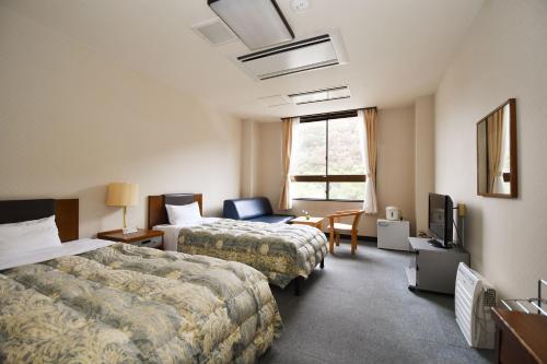 Imagen de la habitación del Hotel Yutoriro Bandai Atami. Foto 7