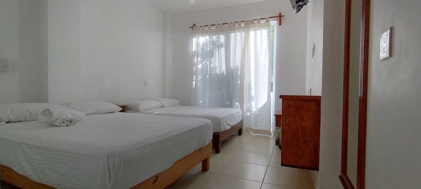Imagen de la habitación del Hotel Yuu-lee Casa Bendita Huatulco. Foto 9