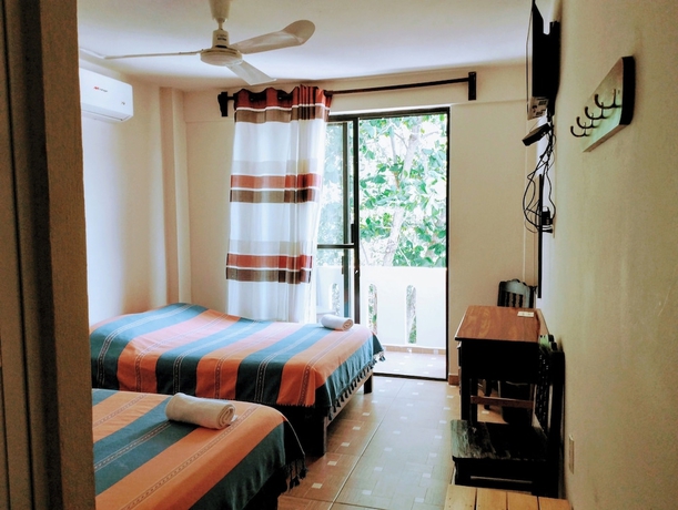 Imagen de la habitación del Hotel Yuu-lee Casa Bendita Huatulco. Foto 10