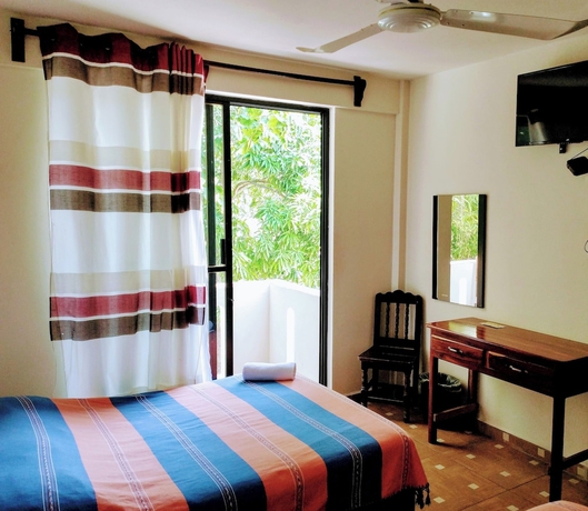 Imagen de la habitación del Hotel Yuu-lee Casa Bendita Huatulco. Foto 11