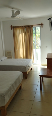 Imagen de la habitación del Hotel Yuu-lee Casa Bendita Huatulco. Foto 13