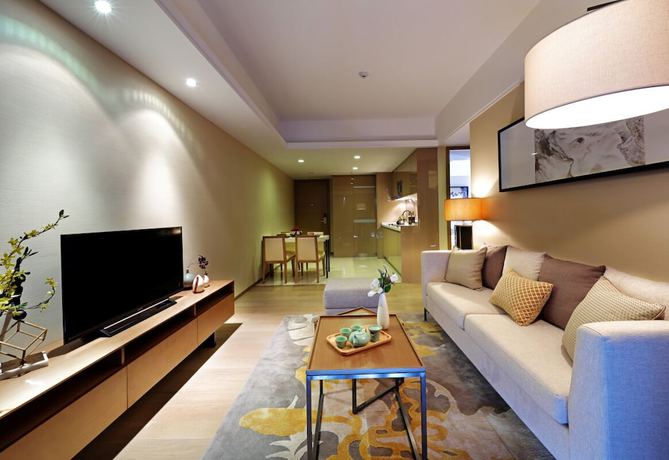 Imagen de la habitación del Hotel Yuwa Serviced. Foto 3