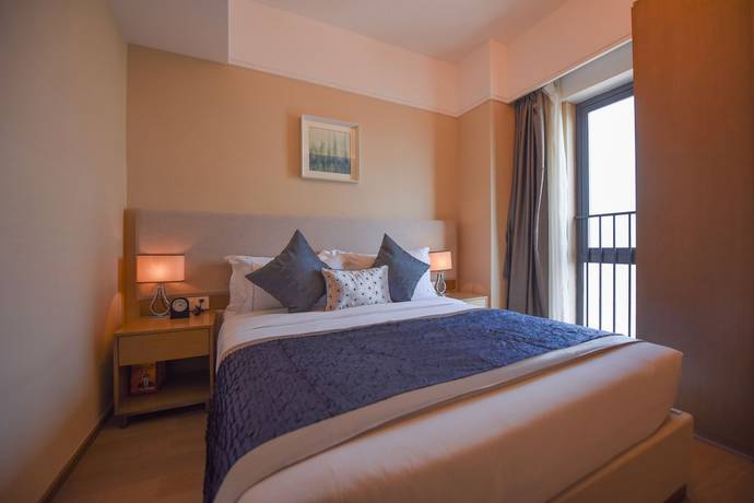 Imagen de la habitación del Hotel Yuwa Serviced. Foto 14