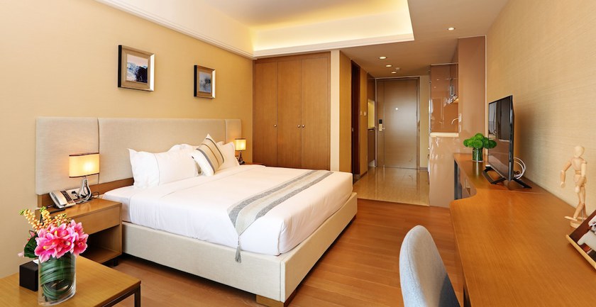 Imagen de la habitación del Hotel Yuwa Serviced. Foto 15