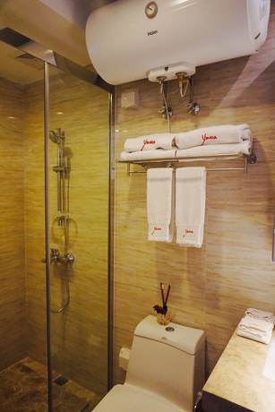 Imagen de la habitación del Hotel Yuwa Serviced. Foto 16