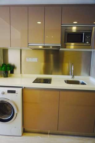 Imagen de la habitación del Hotel Yuwa Serviced. Foto 17
