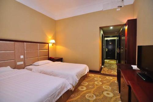 Imagen de la habitación del Hotel Yuxi Hui Jing. Foto 5