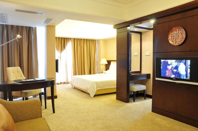 Imagen de la habitación del Hotel Yuxin. Foto 4