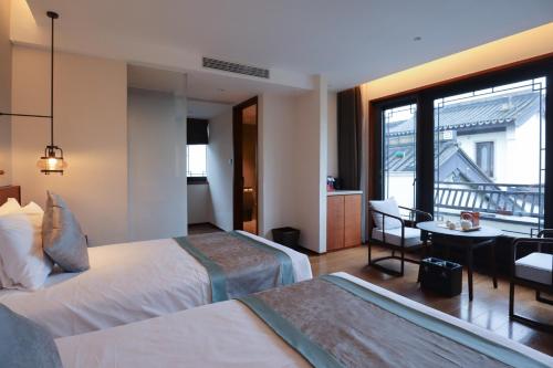 Imagen general del Hotel Yuyao Yangmingguan. Foto 3