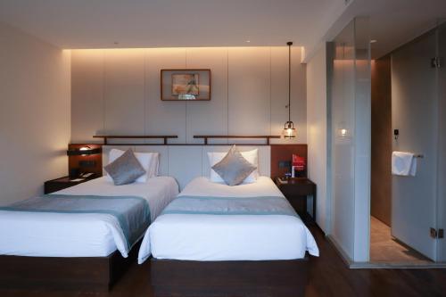 Imagen general del Hotel Yuyao Yangmingguan. Foto 4