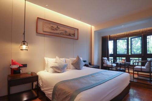 Imagen general del Hotel Yuyao Yangmingguan. Foto 7