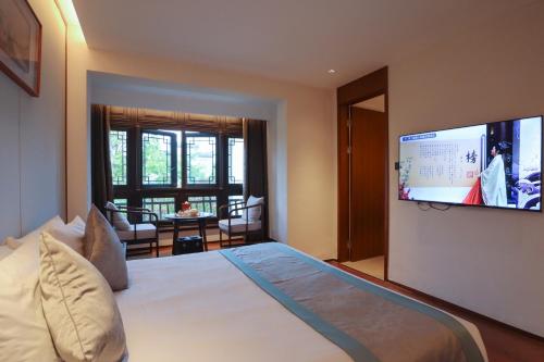 Imagen general del Hotel Yuyao Yangmingguan. Foto 8