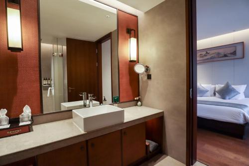 Imagen de la habitación del Hotel Yuyao Yangmingguan. Foto 12