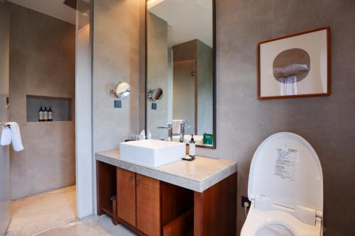 Imagen de la habitación del Hotel Yuyao Yangmingguan. Foto 13