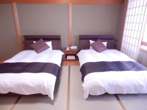 Imagen de la habitación del Hotel Yuyaruru Saisai. Foto 9