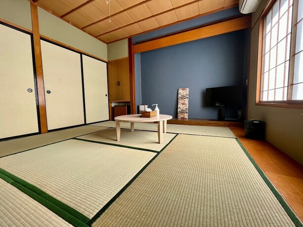 Imagen de la habitación del Hotel Yuzawa House. Foto 15
