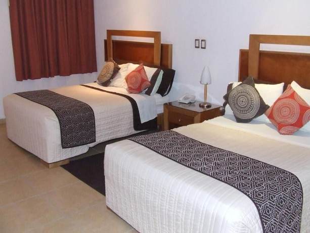 Imagen de la habitación del Hotel Yvette. Foto 10