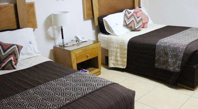 Imagen de la habitación del Hotel Yvette. Foto 15
