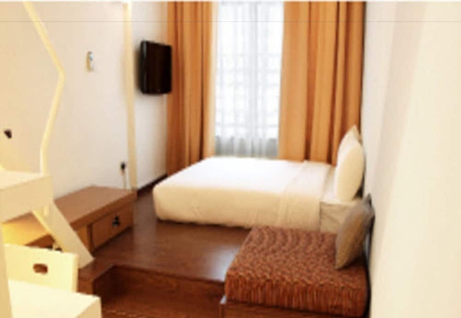 Imagen de la habitación del Hotel Yy38. Foto 5