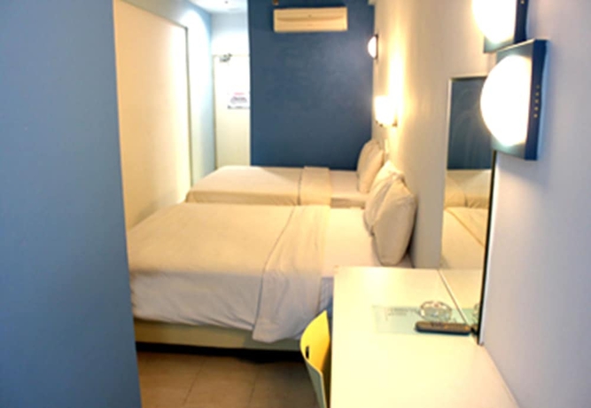 Imagen de la habitación del Hotel Yy38. Foto 7