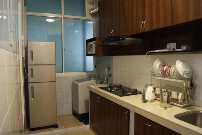 Imagen de la habitación del Hotel Yyk 1borneo Condominium. Foto 10