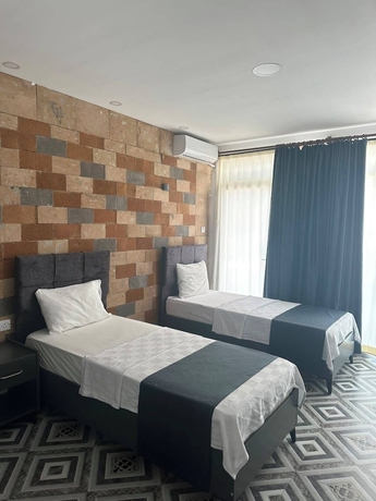 Imagen de la habitación del Hotel ZELLA CITY HOTEL. Foto 12