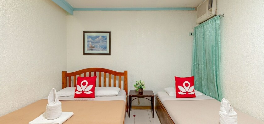 Imagen de la habitación del Hotel ZEN Rooms Basic Mercenary Inn. Foto 4