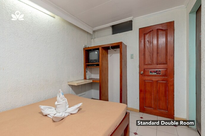 Imagen de la habitación del Hotel ZEN Rooms Basic Mercenary Inn. Foto 5