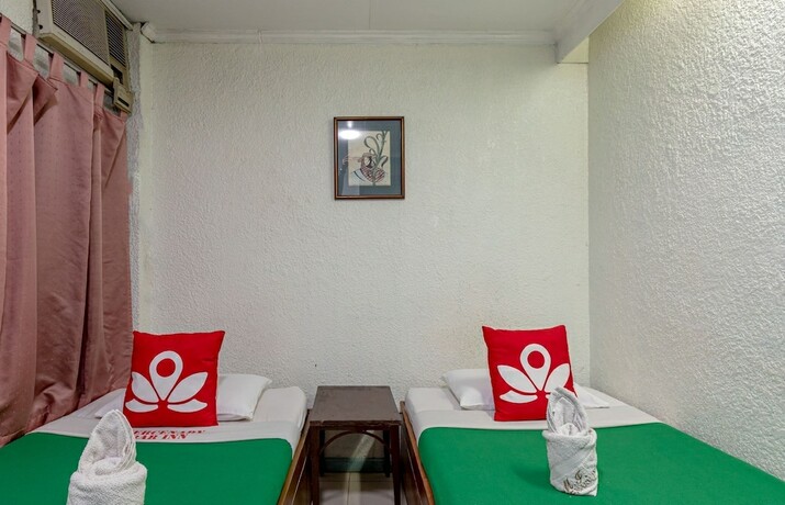 Imagen de la habitación del Hotel ZEN Rooms Basic Mercenary Inn. Foto 11
