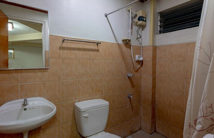 Imagen de la habitación del Hotel ZEN Rooms Basic Mercenary Inn. Foto 14