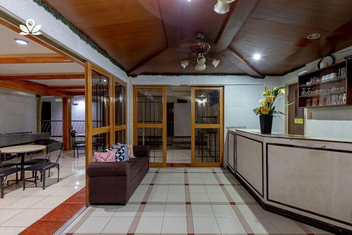 Imagen de los interiores del Hotel ZEN Rooms Basic Mercenary Inn. Foto 19
