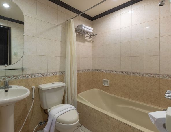 Imagen de la habitación del Hotel ZEN Rooms Camelot Hotel QC. Foto 12