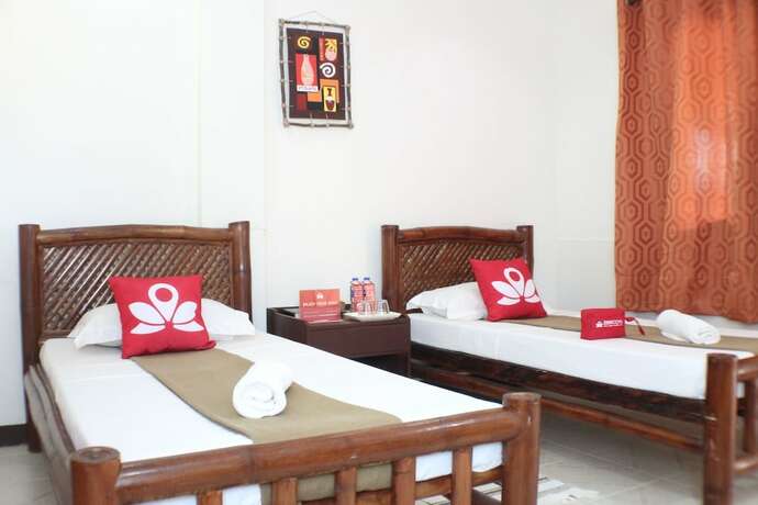 Imagen de la habitación del Hotel ZEN Rooms Chiisai Natsu Little Summer Resort. Foto 14