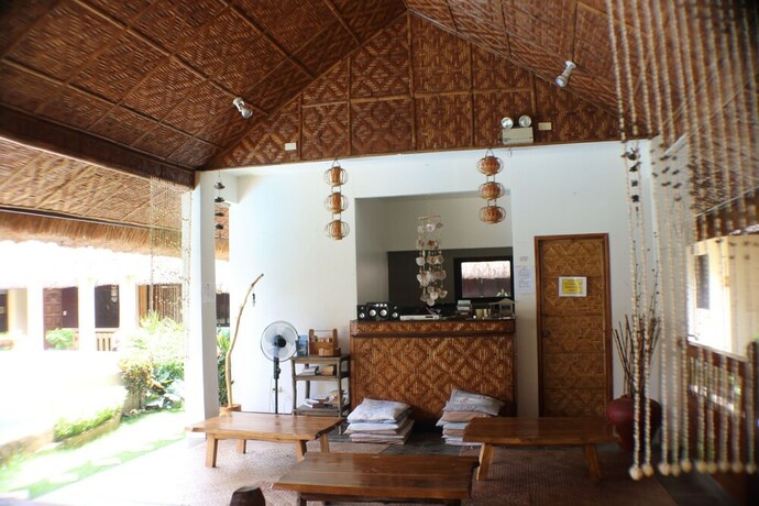 Imagen de los interiores del Hotel ZEN Rooms Chiisai Natsu Little Summer Resort. Foto 18