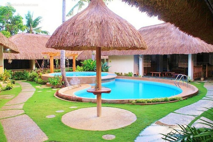 Imagen de la piscina del Hotel ZEN Rooms Chiisai Natsu Little Summer Resort. Foto 20