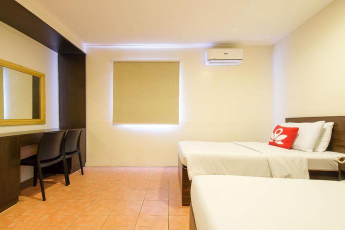 Imagen de la habitación del Hotel ZEN Rooms Ninoy Aquino Airport. Foto 13
