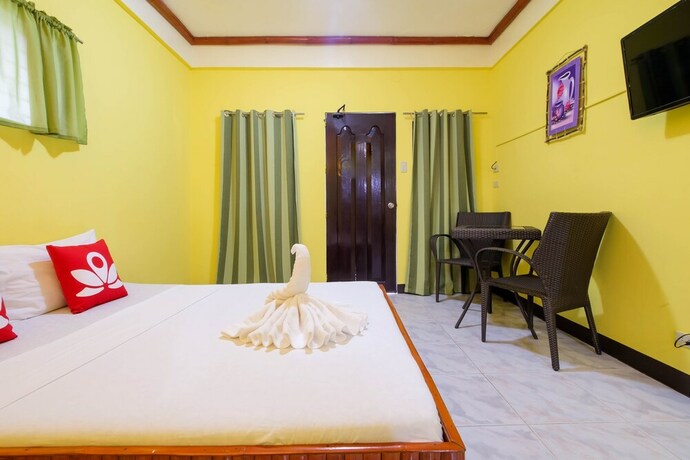 Imagen de la habitación del Hotel ZEN Rooms White Beach. Foto 13